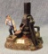 Original Cast Iron Mechanical Bank entitled Casting Bank in original paint 8 by 7