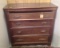 Four drawer 1800's Gentleman's Chest with carved wooden pulls, original finish and divided top drawe