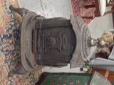 1800's Cast iron Parlor Stove decorated with original Waterpan 35 by 18
