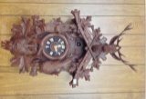 Hunter's decorated Cuckoo Clock With various game animals 32 by 16