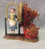 Original Cast Iron Bank depicting Girl Jumping Rope 9 by 9