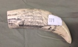 Bone decorated with ship