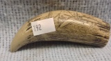 bone decorated with ship