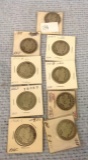 Nine Draped Hair Half Dollars