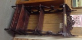 Three tier etagere with pierced crest and single drawer base  59 by 26 by 15