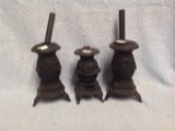Three miniature pot belly wood stoves 9 tall