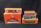 Six Lionel Train Cars in Boxes