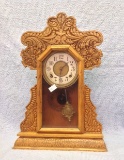 Ornate carved oak Kitchen Clock by Ingraham Key wind 22 tall