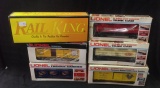 Five Lionel Train Cars in boxes