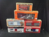 Six various Lionel Train Cars in boxes