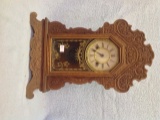 Ornate Oak Waterbury key wind Kitchen Clock  22 tall
