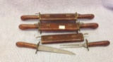 Three wooden handle serving pieces