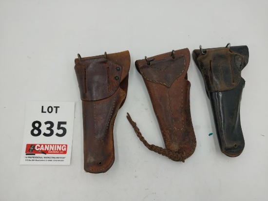 3 leather pistol holsters