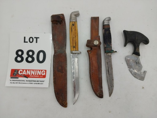 2 hunting knives with sheaths and gut knife