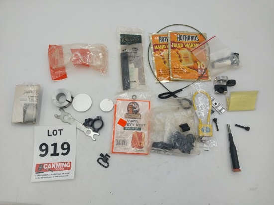 assortment of gu parts, safety glass, gun lock