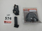 Leather holster, pistol mag, protective headphones