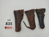 3 leather pistol holsters