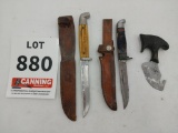 2 hunting knives with sheaths and gut knife