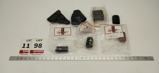 assorted leather holsters & Magizine belt clips