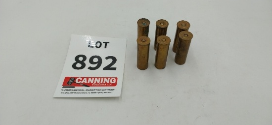6 vintage brass shotgun shell casings