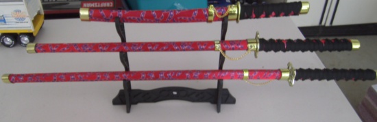 NOVELTY SWORD COLLECTION WITH PLASTIC STANDS AND CONFEDERATE SHEATHS