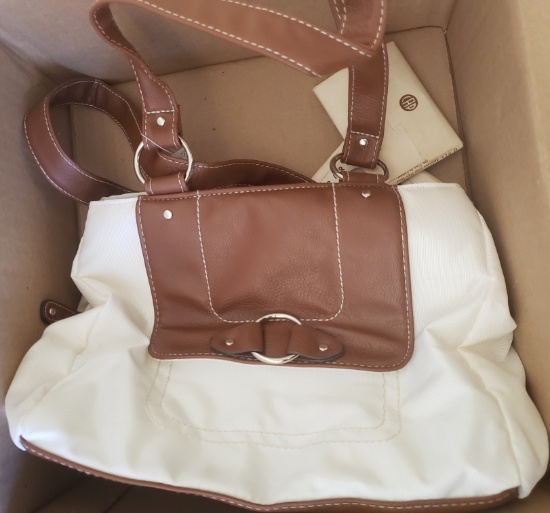 WHITE PURSE WITH TAGS ATTACHED