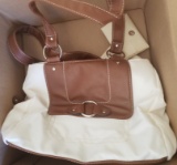 WHITE PURSE WITH TAGS ATTACHED