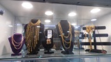 ASSORTED DECORATIVE NECKLACES w/ DISPLAY