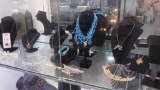 ASSORTED DECORATIVE NECKLACES & RINGS