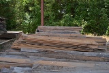 LOT OF LUMBER  LOCATED BEHIND PLANER MILL