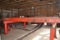 MELLOTT 21' 3 STRAND LOG DECK W/ 3 ARM STOP & LOADER W/ NOSE SKIDS W/ HYDRUALIC DRIVE