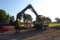 CAT 519 KNUCKLEBOOM LOADER W/ CONT GRAPPLE W/ JOYSTICK CONTROLS W/ SAW PACKAGE HOOKUP MOUNTED ON PIT