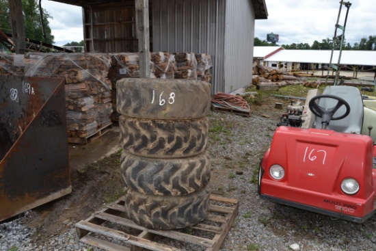 (4) 265-70-16.5 SKID STEER TIRES ON BOBCAT WHEELS