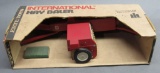 Ertl IH Hay Baler 1968 red box with bales.