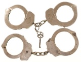 Two Pairs Of Vintage Handcuffs