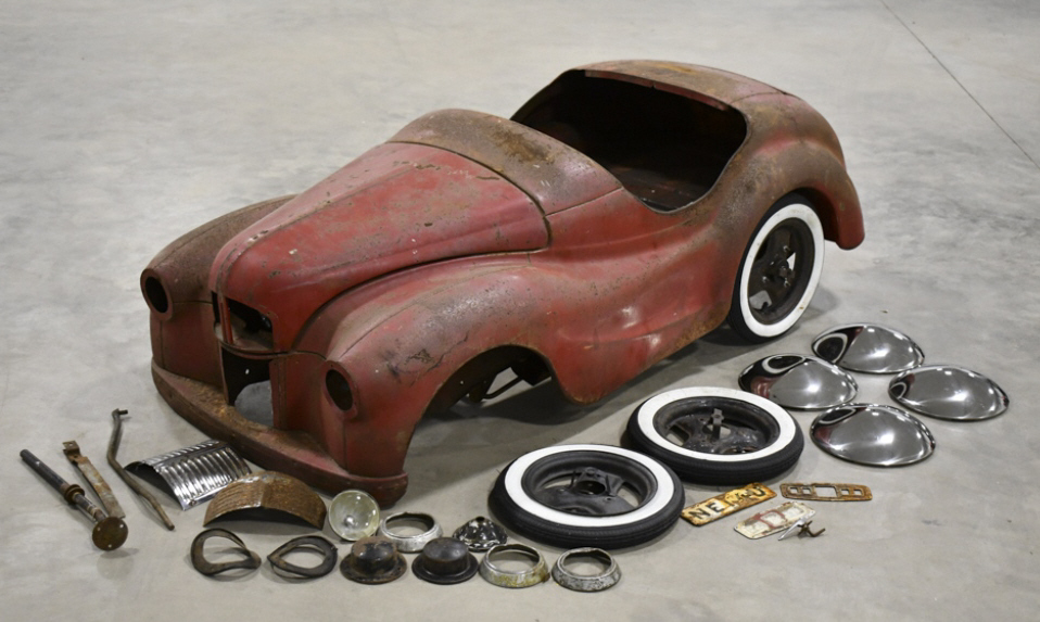 An Austin J40 clothe pedal car