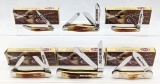 7) 2010 Case XX 2nd Cut Red Stag Knives w/ Boxes