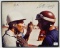 Stirling Moss and Juan Manuel Fangio Signed Photo