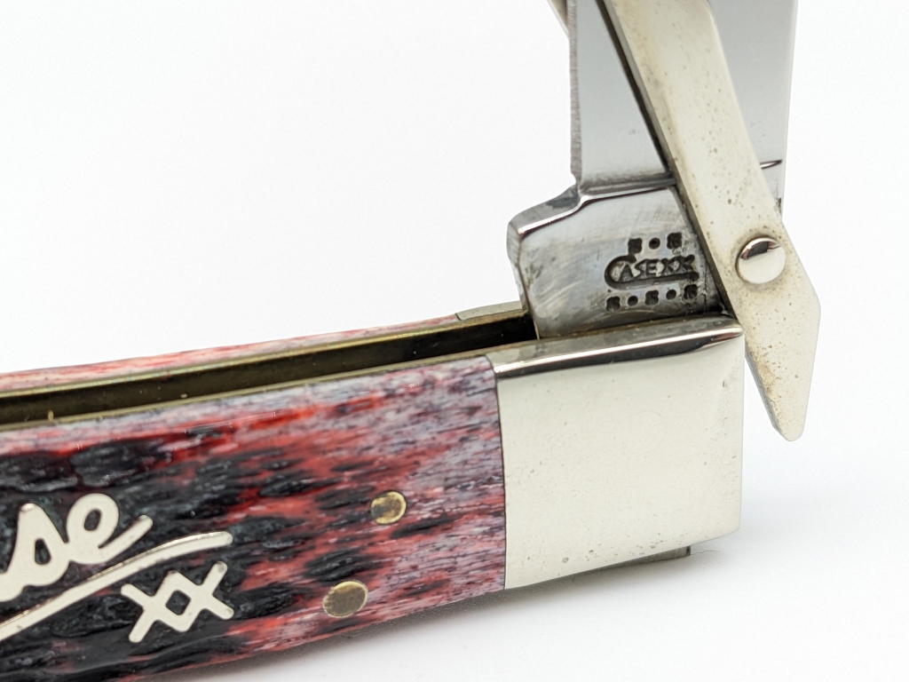 2002 Case XX Cranberry Silver Script Cheetah | Proxibid