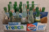 Various Brand Soda Bottles & Cardboard Carriers
