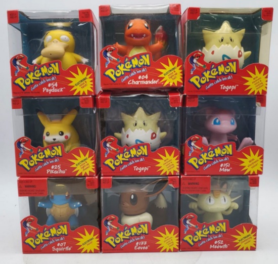 9 PokŽmon Electronic Figures including Charmander, Squirtle, and More.