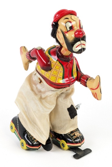 TPS Japan Tin Windup Clown on Roller Skates