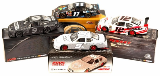 (4) 1:24 Autographed Brad Keselowski, Marcos Ambrose, Kasey Kahne, & Denny Hamlin Die-Cast Collectab