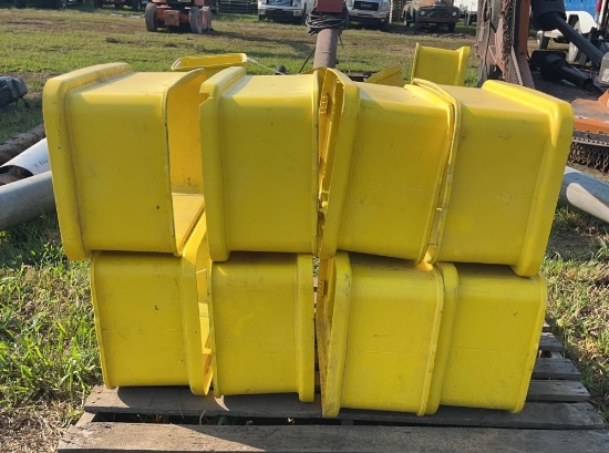 8 yellow agricultural bins
