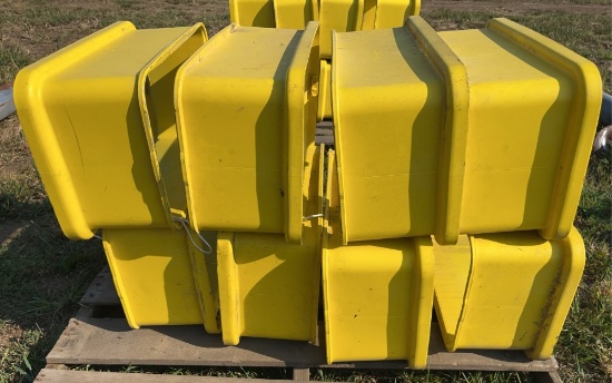 8 yellow agricultural bins