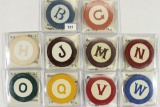 10 VINTAGE POKER CHIPS WITH LETTERS ON THEM