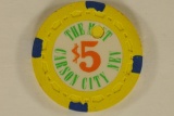 $5 CASINO CHIP. THE M?T. WITH HOLE STARTED.