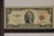 1953-A US $2 RED SEAL NOTE. INK ON LEFT OF OBVERSE