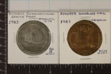 2-METAL CASINO GAMING TOKENS: $1-1983 RESORTS