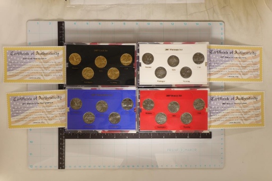 4 SETS OF 2007 US QUARTERS IN BOXES WITH PAPERS